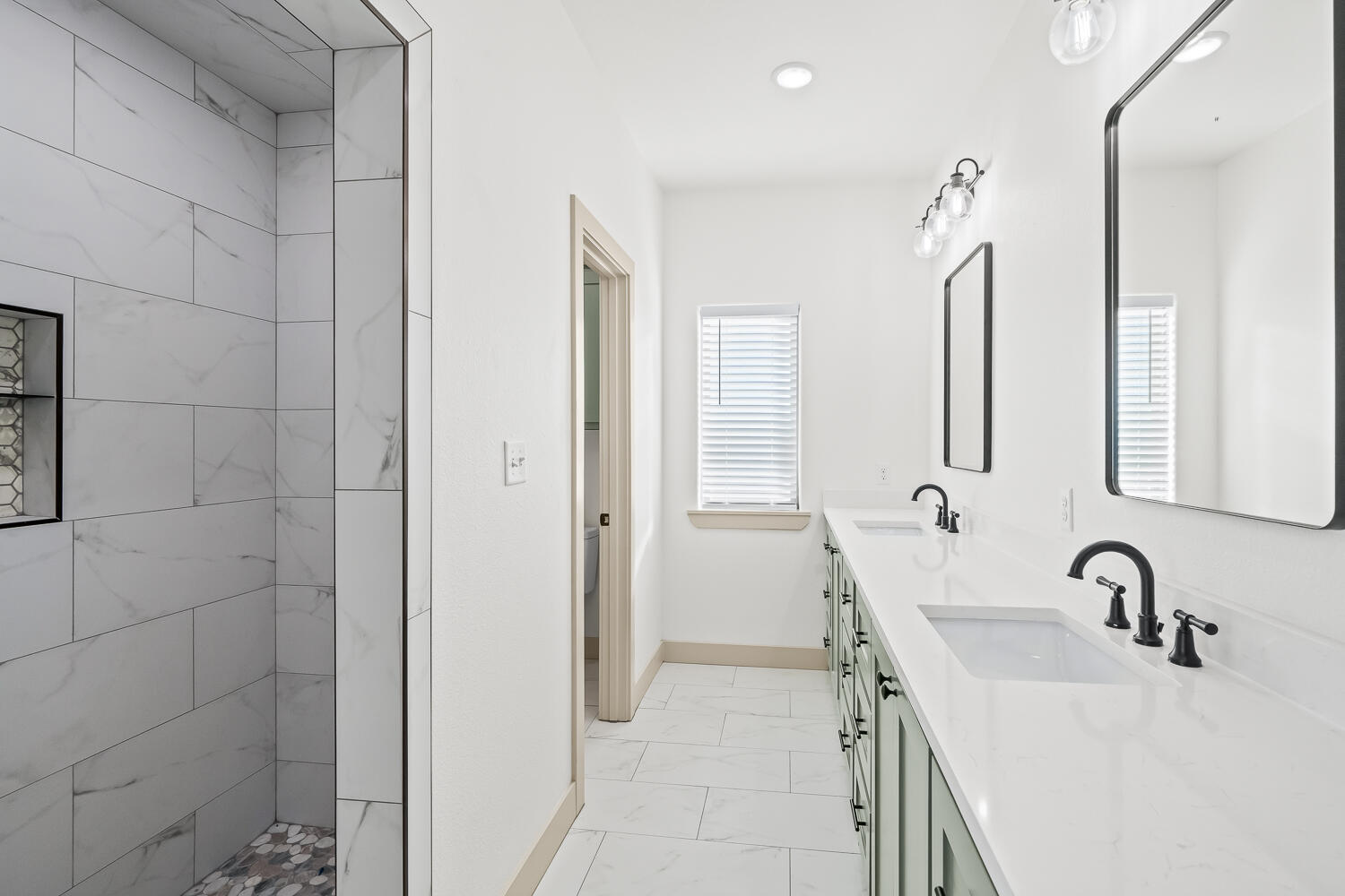 8412 North County Road 1300 Shallowater, TX 79363 - Photo 8 of 43 a bathroom with a sink and a mirror