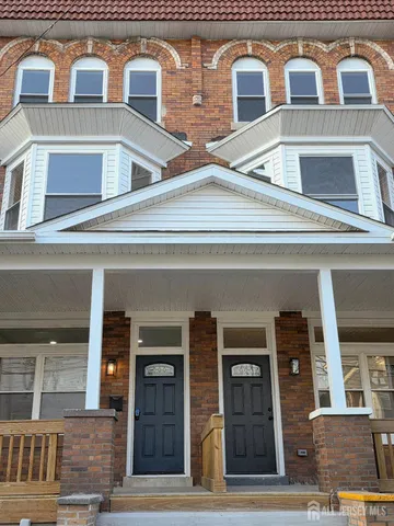 a front view of residential houses