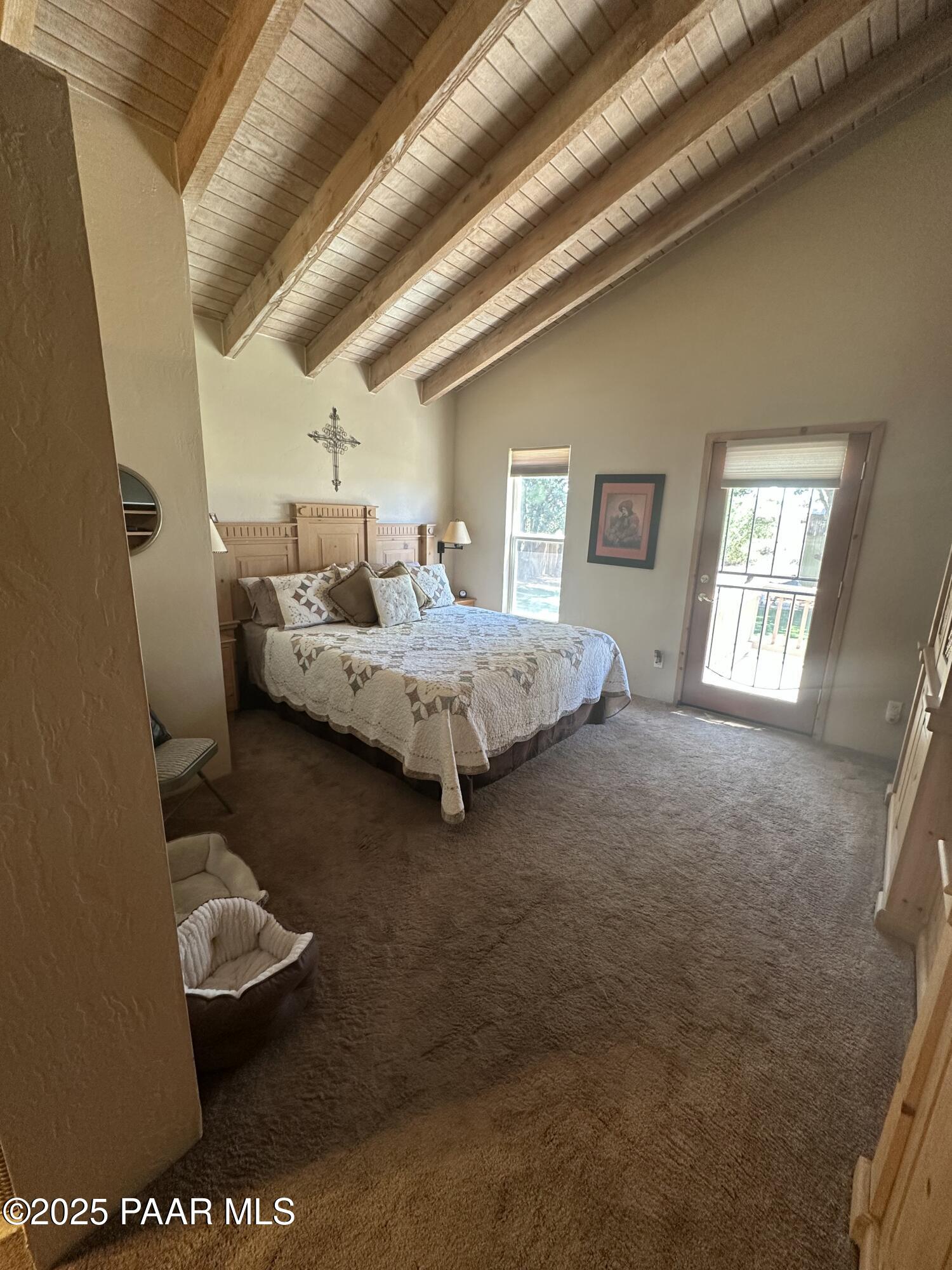 13502 South Burton Road Mayer, AZ 86333 - Photo 38 of 46 a bedroom with furniture and window