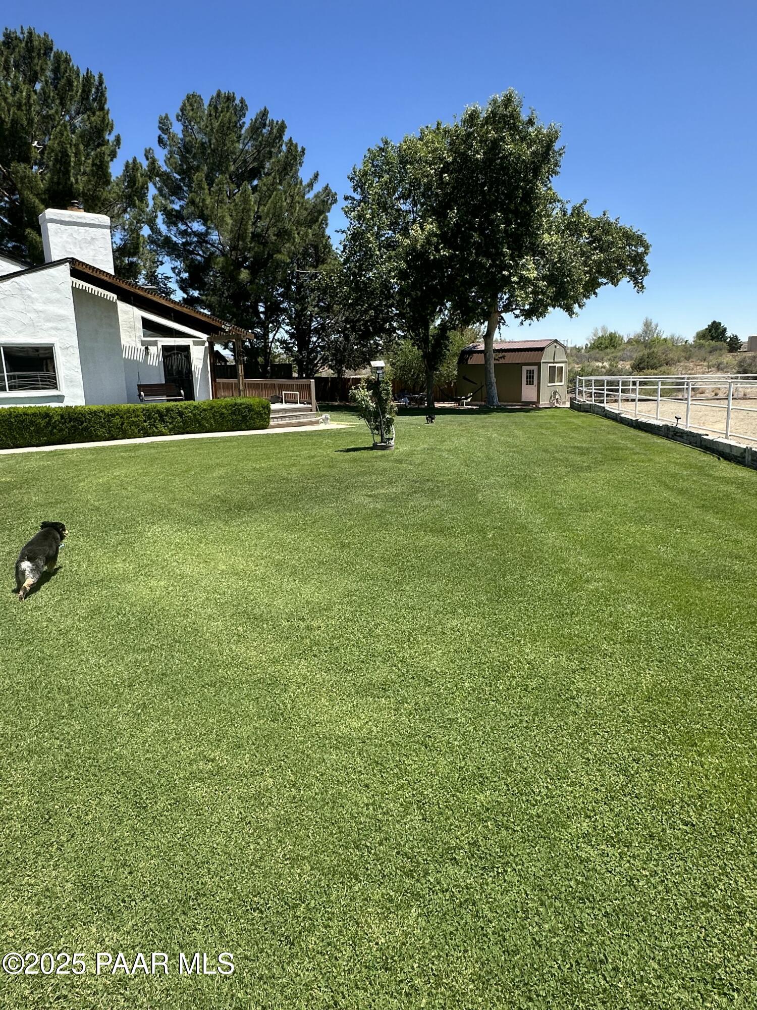 13502 South Burton Road Mayer, AZ 86333 - Photo 10 of 46 a front view of a house with garden