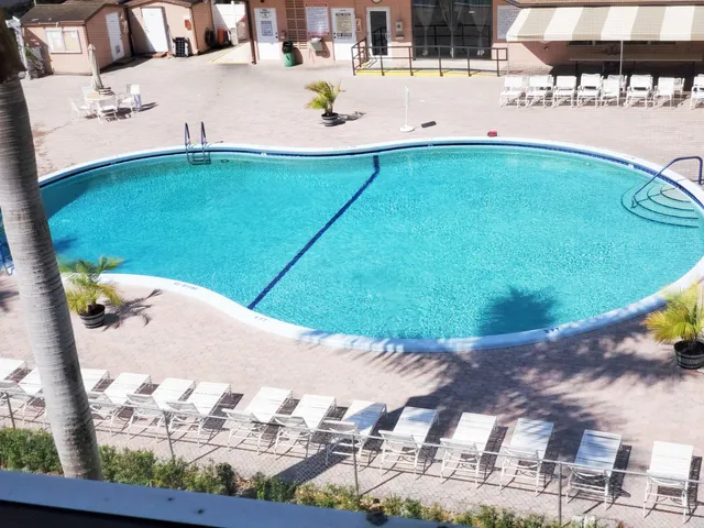 a view of a chairs and tables in the patio