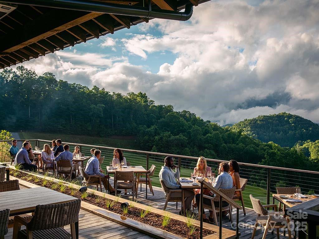 239 Down The Hl Road, Unit 239 Sylva, NC 28779 - Photo 9 of 18 a view of roof deck with furniture