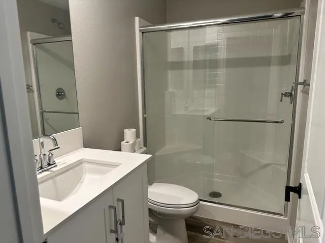 1767 Whitmore Loop Chula Vista, CA 91913 - Photo 12 of 22 a bathroom with a sink and a mirror