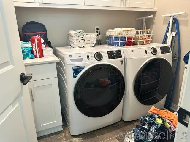 1767 Whitmore Loop Chula Vista, CA 91913 - Photo 17 of 22 a utility room with dryer and washer