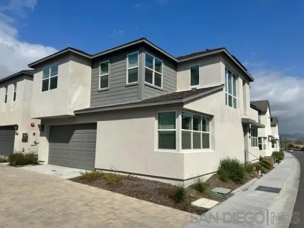 a front view of a house with windows
