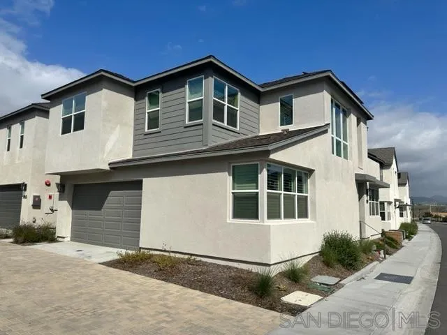 1767 Whitmore Loop Chula Vista, CA 91913 - Photo 2 of 22 a front view of a house with windows