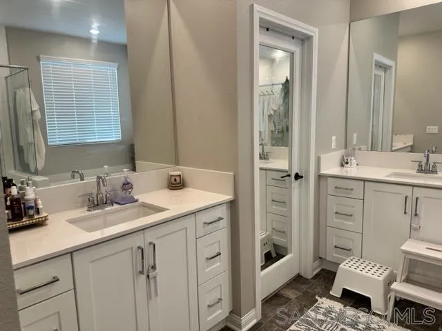 1767 Whitmore Loop Chula Vista, CA 91913 - Photo 22 of 22 a bathroom with a sink toilet and shower