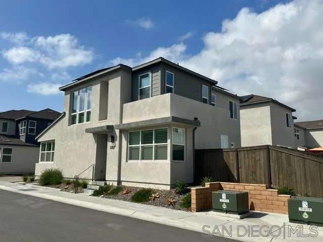 1767 Whitmore Loop Chula Vista, CA 91913 - Photo 4 of 22 a front view of a house with a garage