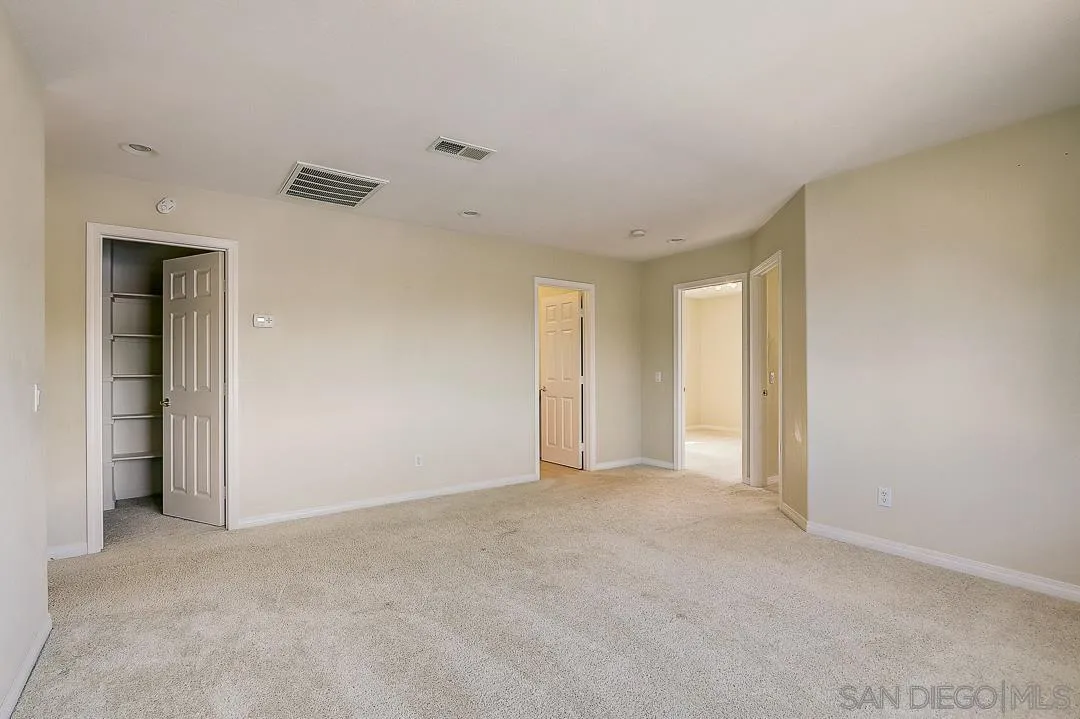 551 Dundee Lane San Marcos, CA 92069 - Photo 18 of 30 a view of an empty room and a window