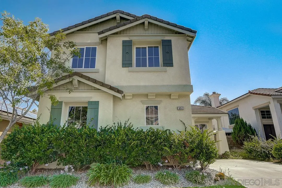 551 Dundee Lane San Marcos, CA 92069 - Photo 6 of 30 a front view of a house with a yard
