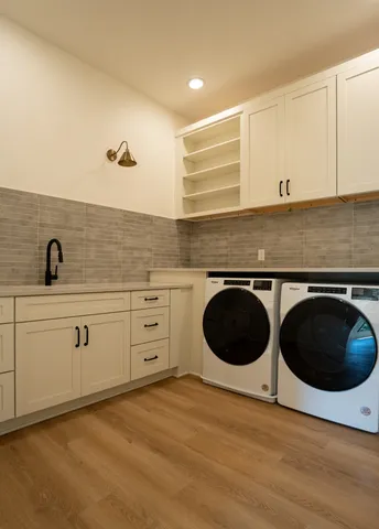 a kitchen with a stove and a sink