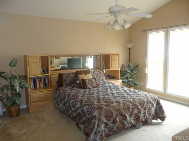 10405 Perry Ridge Court Zebulon, NC 27597 - Photo 6 of 10 Huge master suite with catderal ceilings