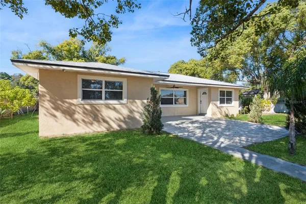 front view of a house with a yard