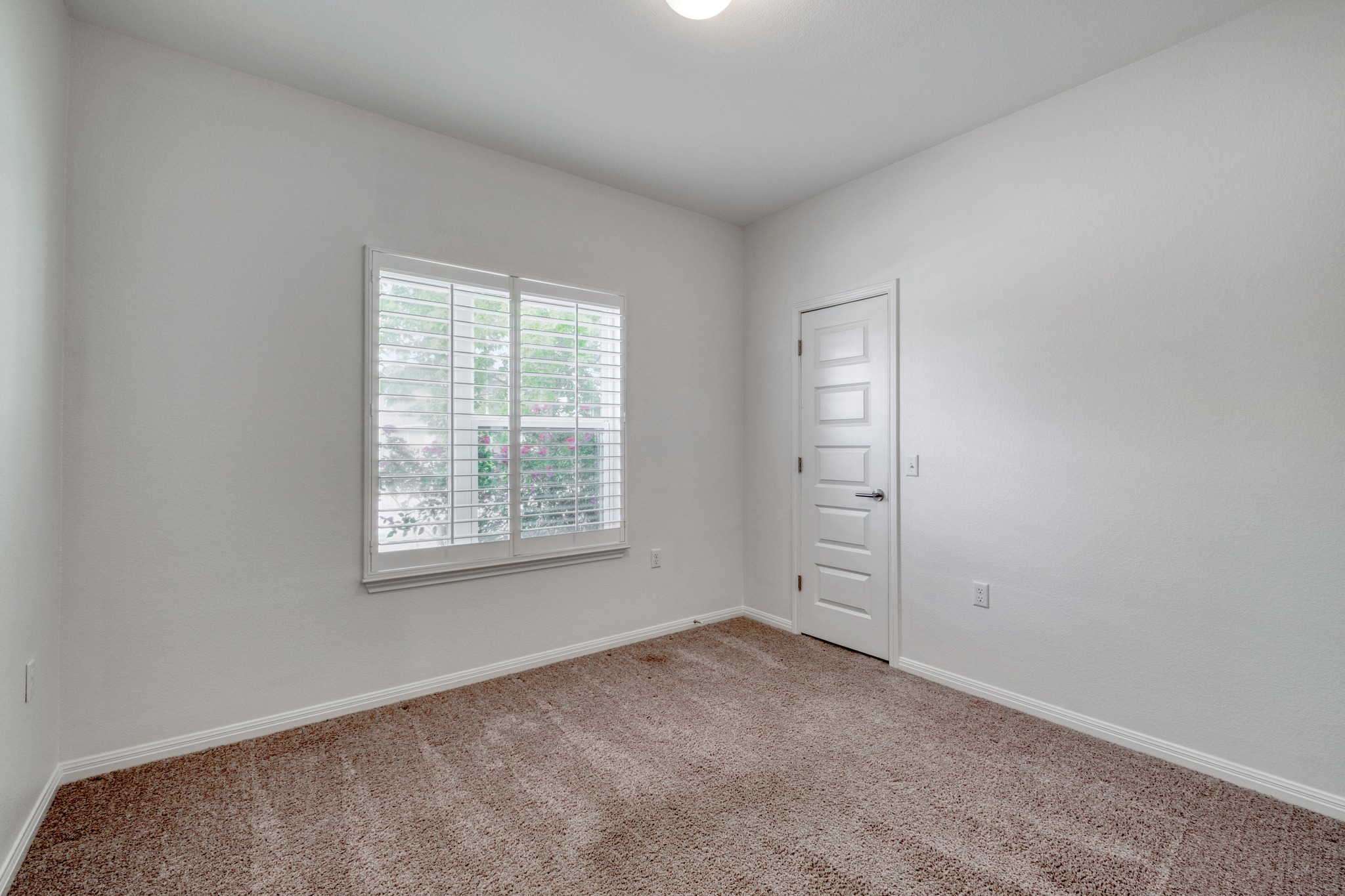 16400 Fetching Avenue Manor, TX 78653 - Photo 15 of 32 Empty room featuring baseboards and carpet