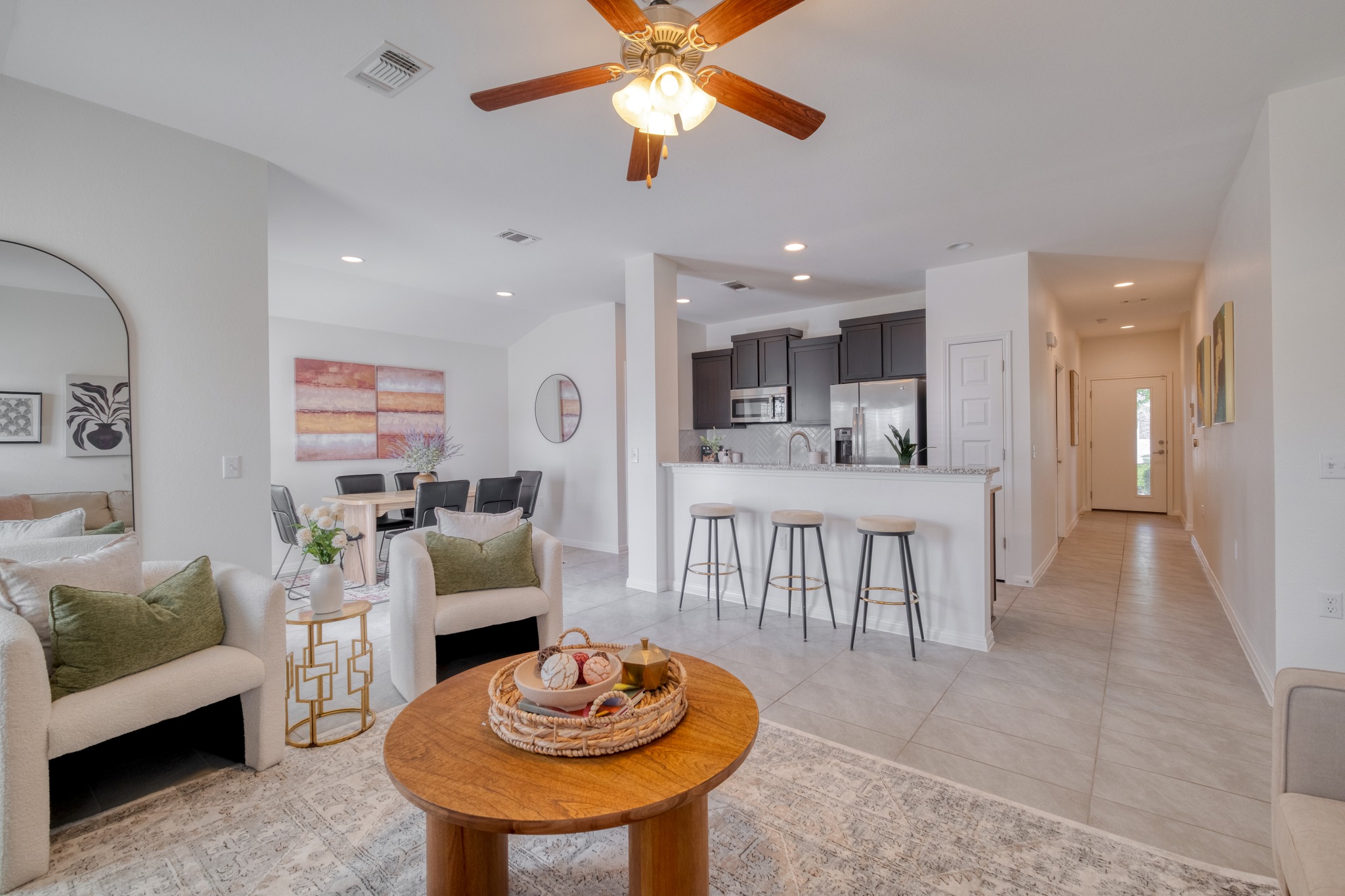 16400 Fetching Avenue Manor, TX 78653 - Photo 4 of 32 Living area featuring a ceiling fan, recessed lighting, and light tile patterned flooring