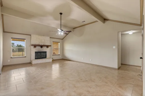 a view of a kitchen with a sink and a chandelier