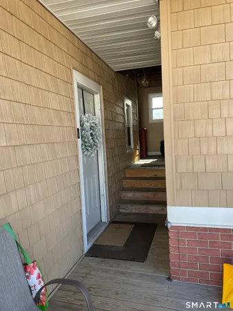 a kitchen with stainless steel appliances granite countertop a refrigerator sink and cabinets