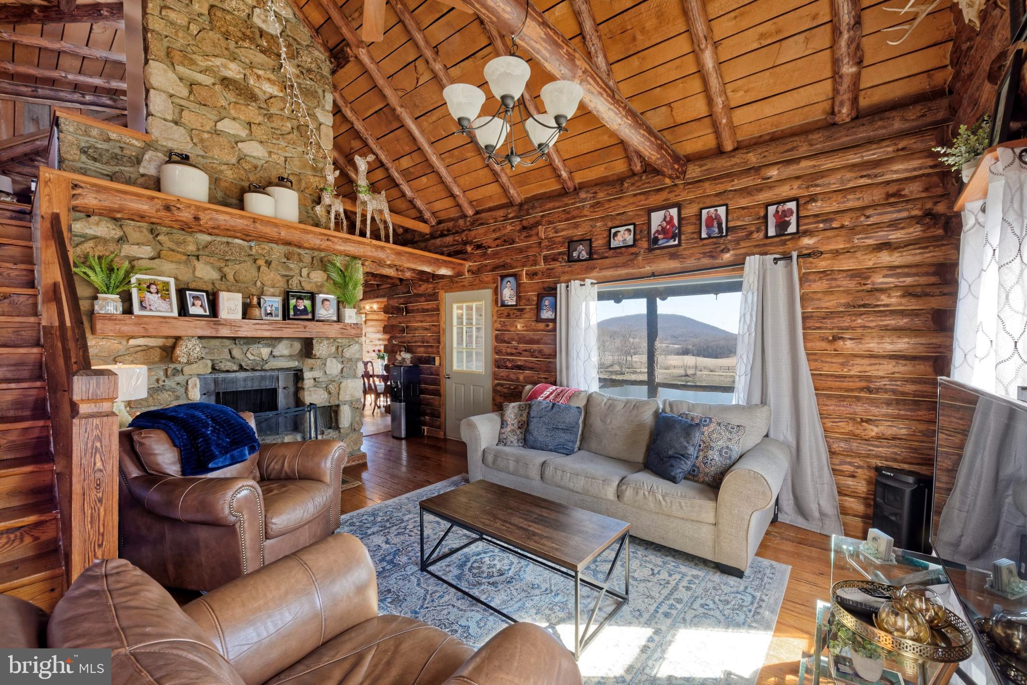 4392 Carrington Road Markham, VA 22643 - Photo 45 of 59 Living Room w/a floor to ceiling stone fireplace