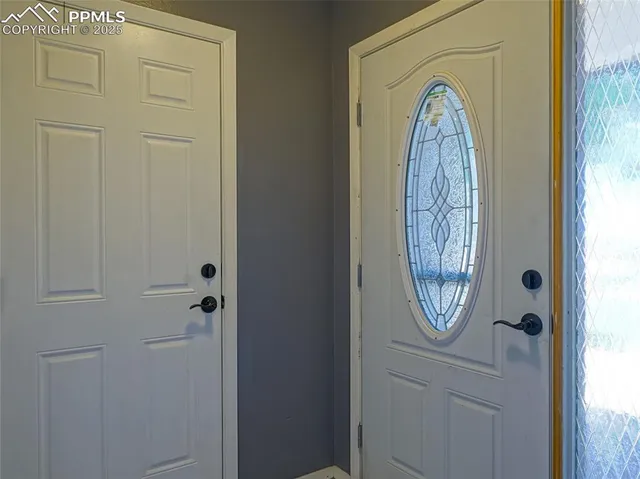 a view of a cabinet with mirror