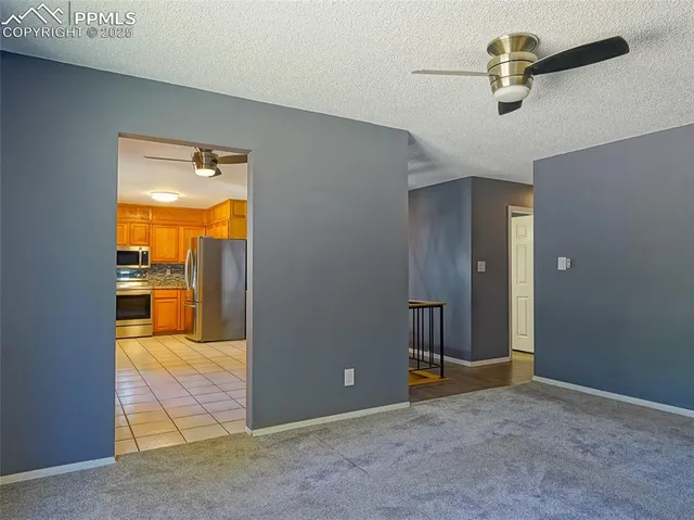 wooden floor in an empty room with a cabinet