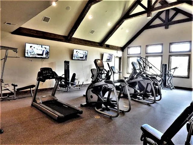 a view of a room with gym equipment