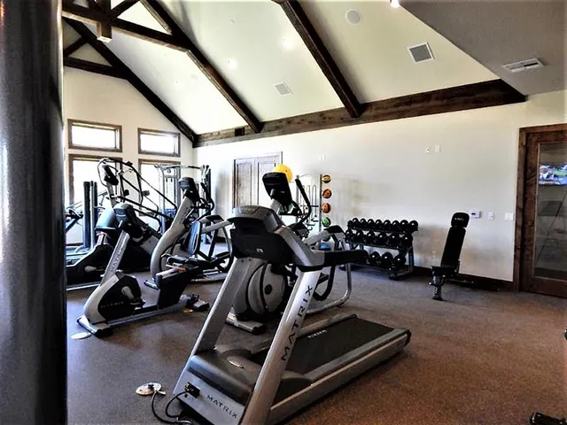 a view of a room with gym equipment