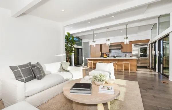 a living room with furniture and a table