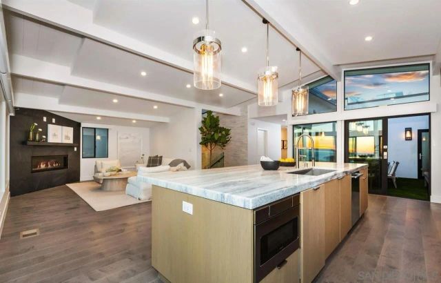 a patio with a table and chairs