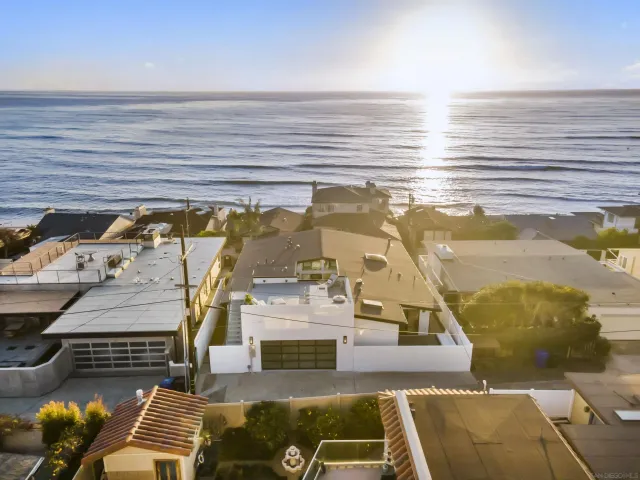 a view of roof deck with patio