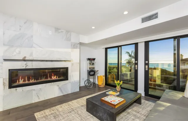 a living room with furniture oven and a fireplace