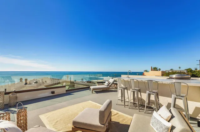 a view of a terrace with furniture