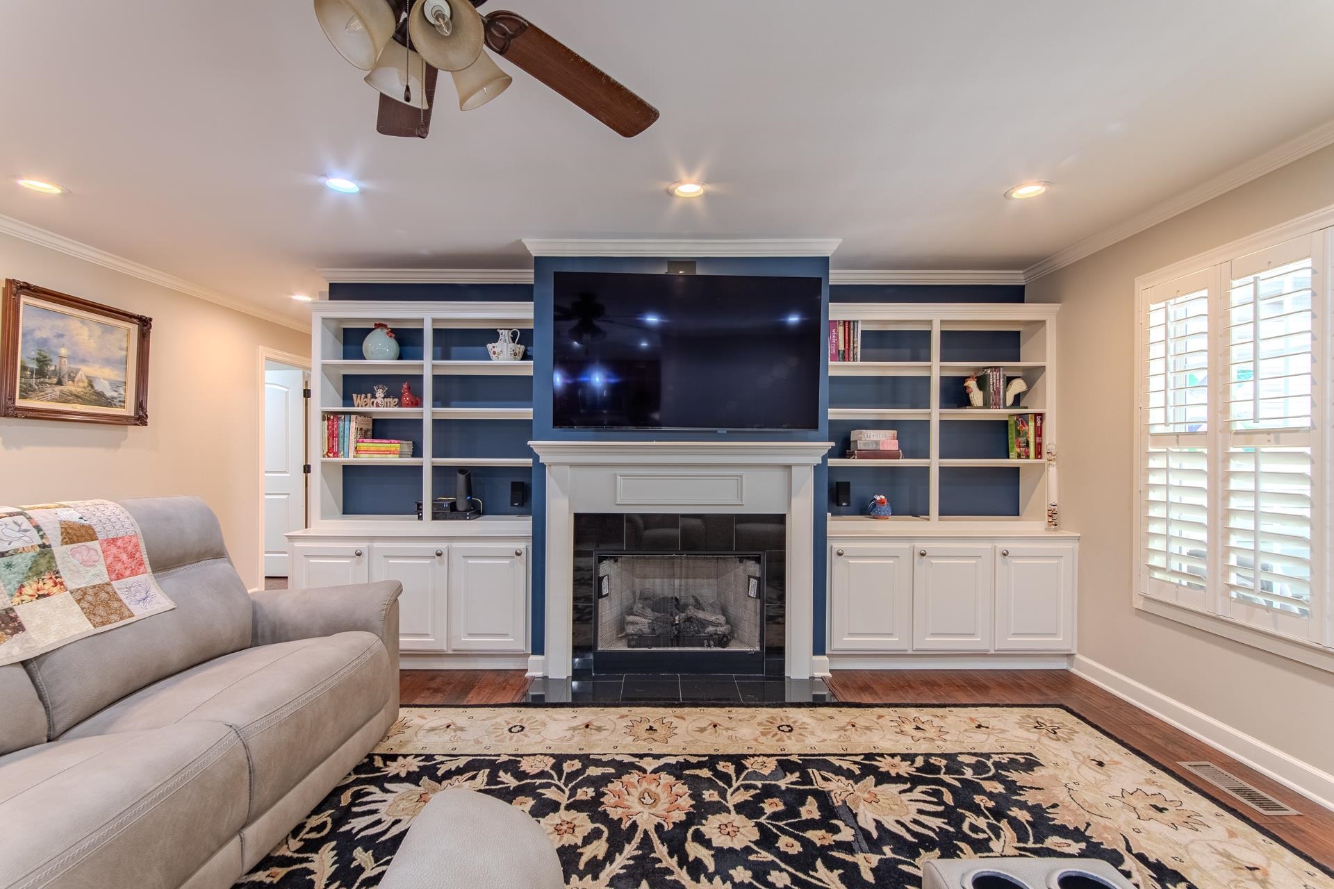 115 Partridge Lane Savannah, TN 38372 - Photo 16 of 40 a living room with furniture and a fireplace