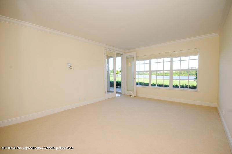 2185 Ibis Isle Road, Unit 2 Palm Beach, FL 33480 - Photo 11 of 26 a view of an empty room with a window