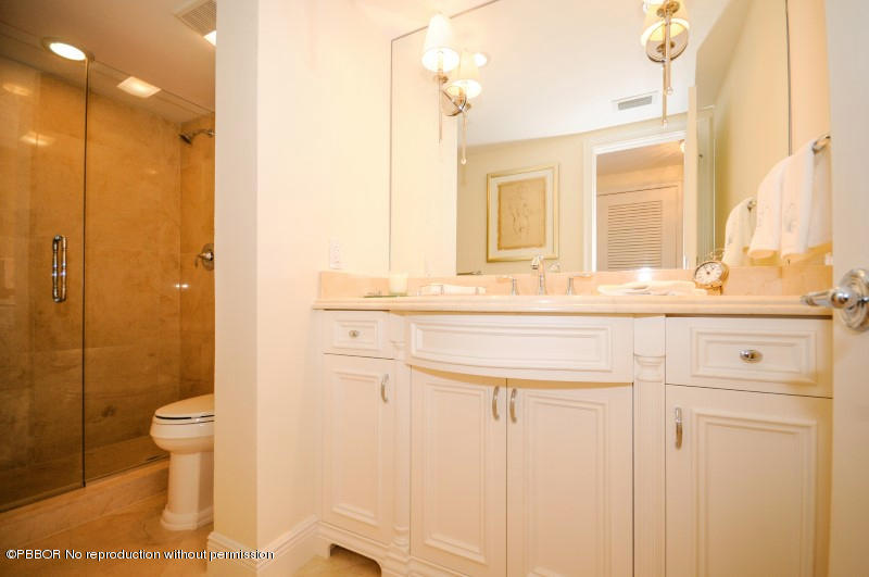 2185 Ibis Isle Road, Unit 2 Palm Beach, FL 33480 - Photo 14 of 26 a bathroom with a sink and a mirror