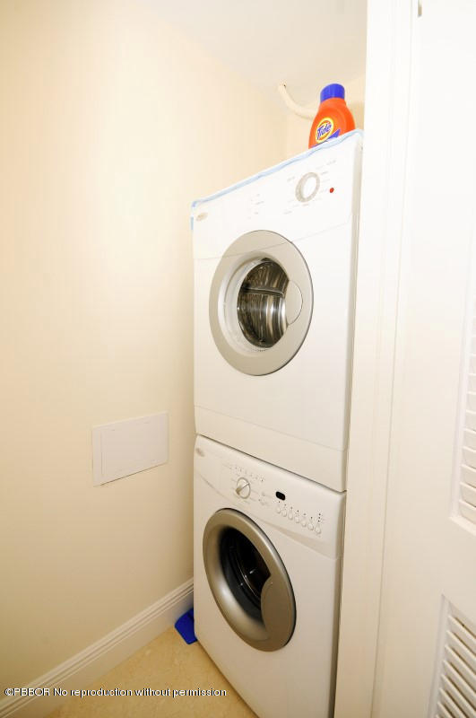 2185 Ibis Isle Road, Unit 2 Palm Beach, FL 33480 - Photo 16 of 26 a utility room with dryer and washer