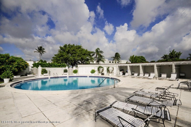 2185 Ibis Isle Road, Unit 2 Palm Beach, FL 33480 - Photo 22 of 26 a view of a patio with swimming pool