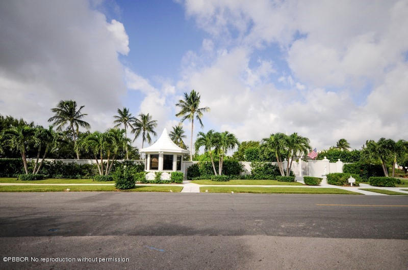 2185 Ibis Isle Road, Unit 2 Palm Beach, FL 33480 - Photo 25 of 26 a front view of a house with swimming pool and yard