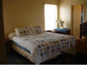 850 West Iris Road, Unit 4 Paulden, AZ 86334 - Photo 5 of 12 a bedroom with a bed and a window
