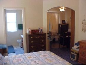 850 West Iris Road, Unit 4 Paulden, AZ 86334 - Photo 6 of 12 a bedroom with a bed and a dresser