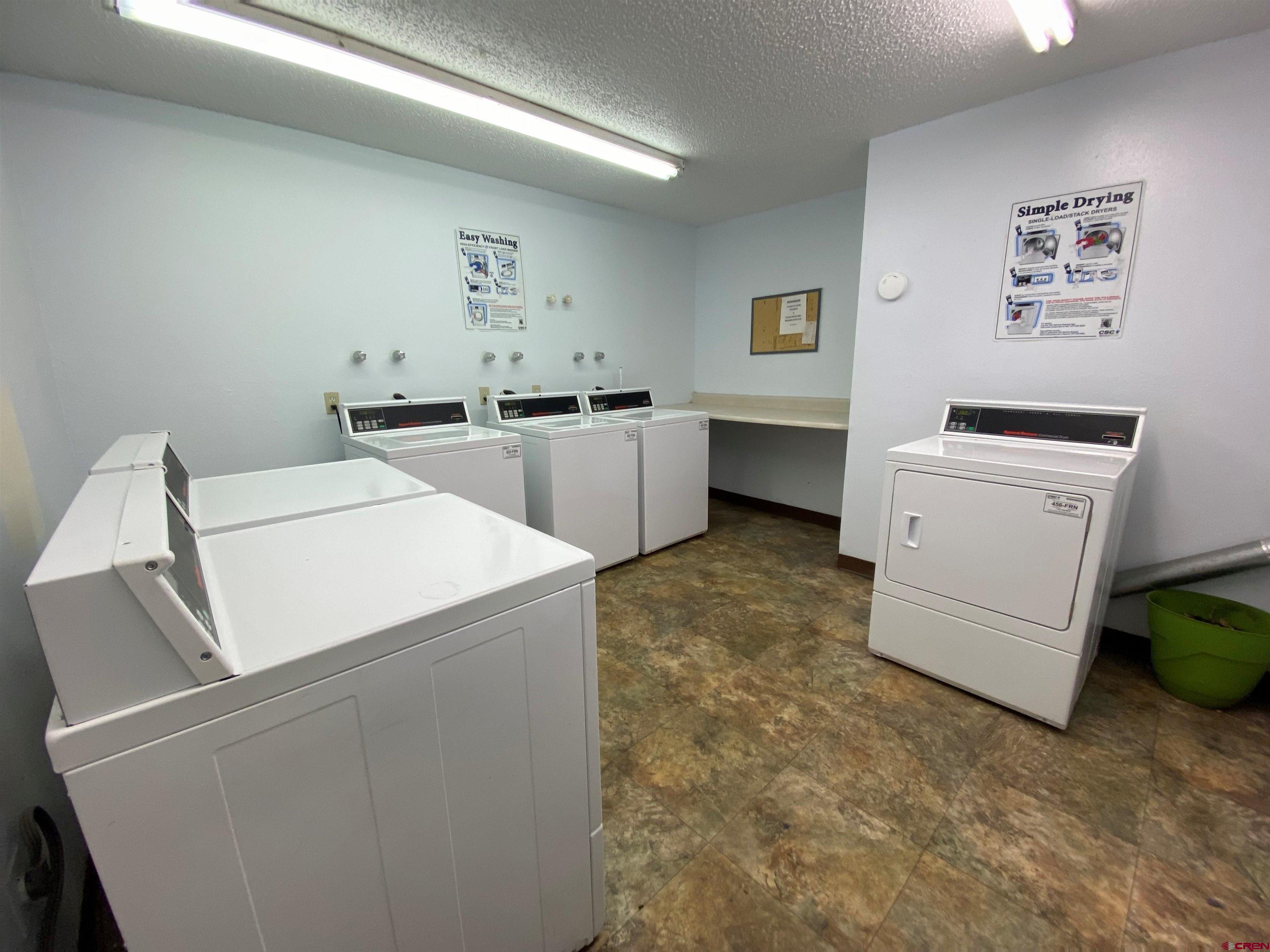 1135 Florida Road, Unit C7 Durango, CO 81301 - Photo 28 of 33 a utility room with dryer and washer
