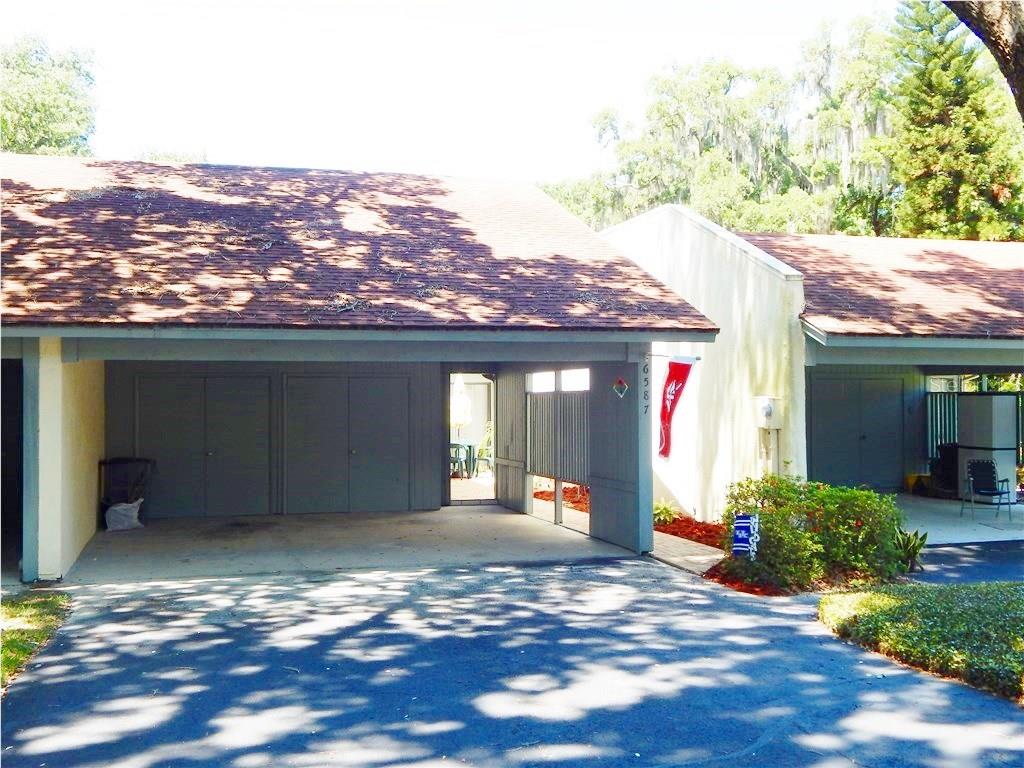 6587 Trail Ridge Drive Lakeland, FL 33813 - Photo 1 of 1 a view of a house with a yard