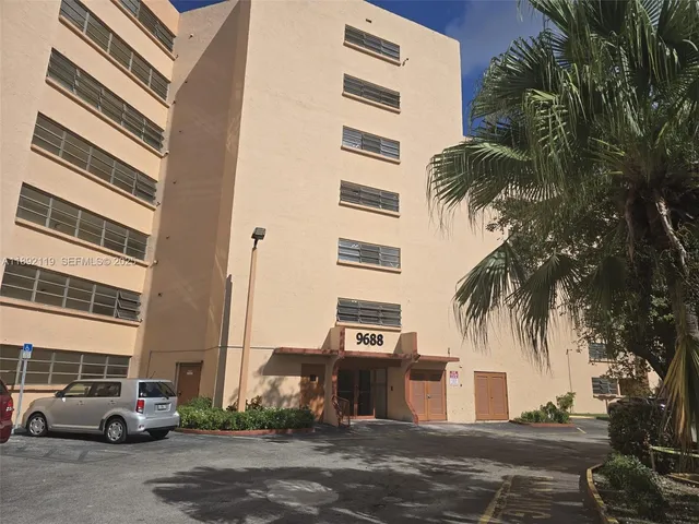 a front view of a building with street view