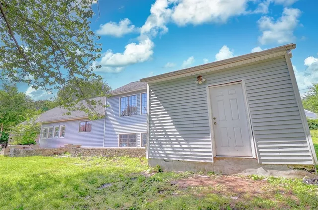a house view with a garden space