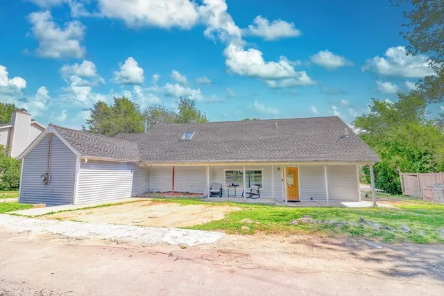 a view of a house with a swimming pool