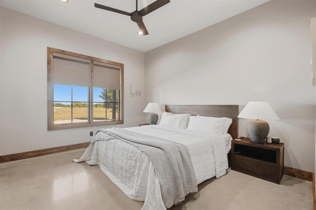 483 County Road 353 Merkel, TX 79536 - Photo 28 of 40 a bedroom with bed and window