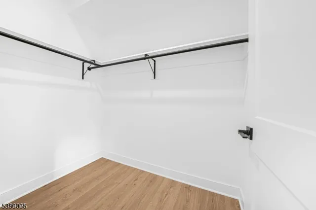 a view of small space with racks on the wall