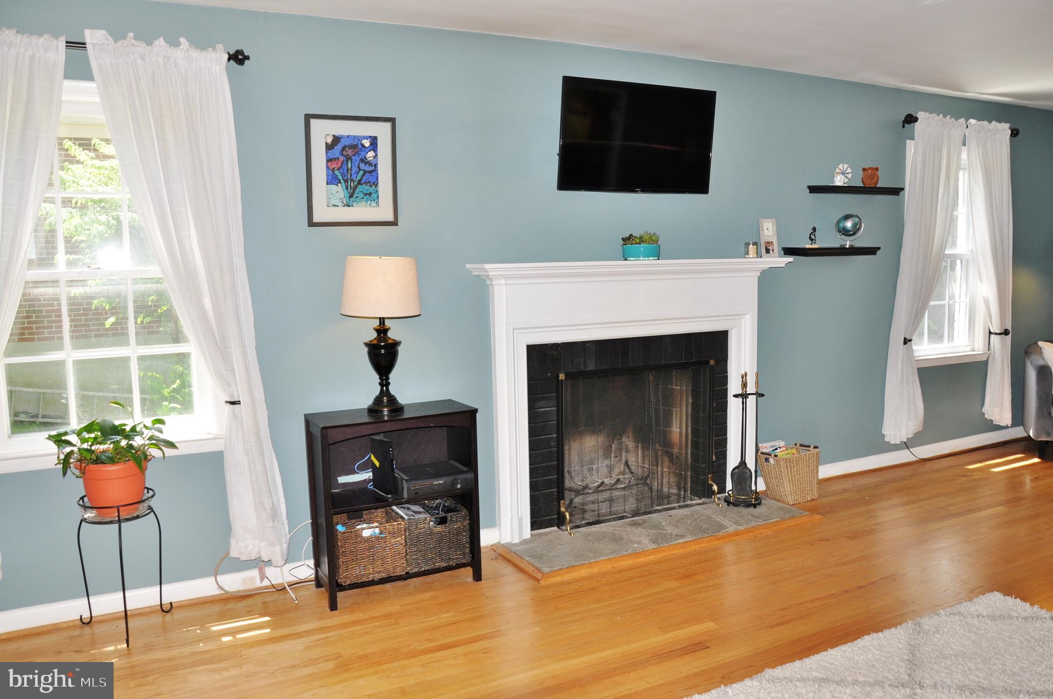 6756 Glenkirk Road Baltimore, MD 21239 - Photo 2 of 83 Lovely living room with gorgeous wood floors!