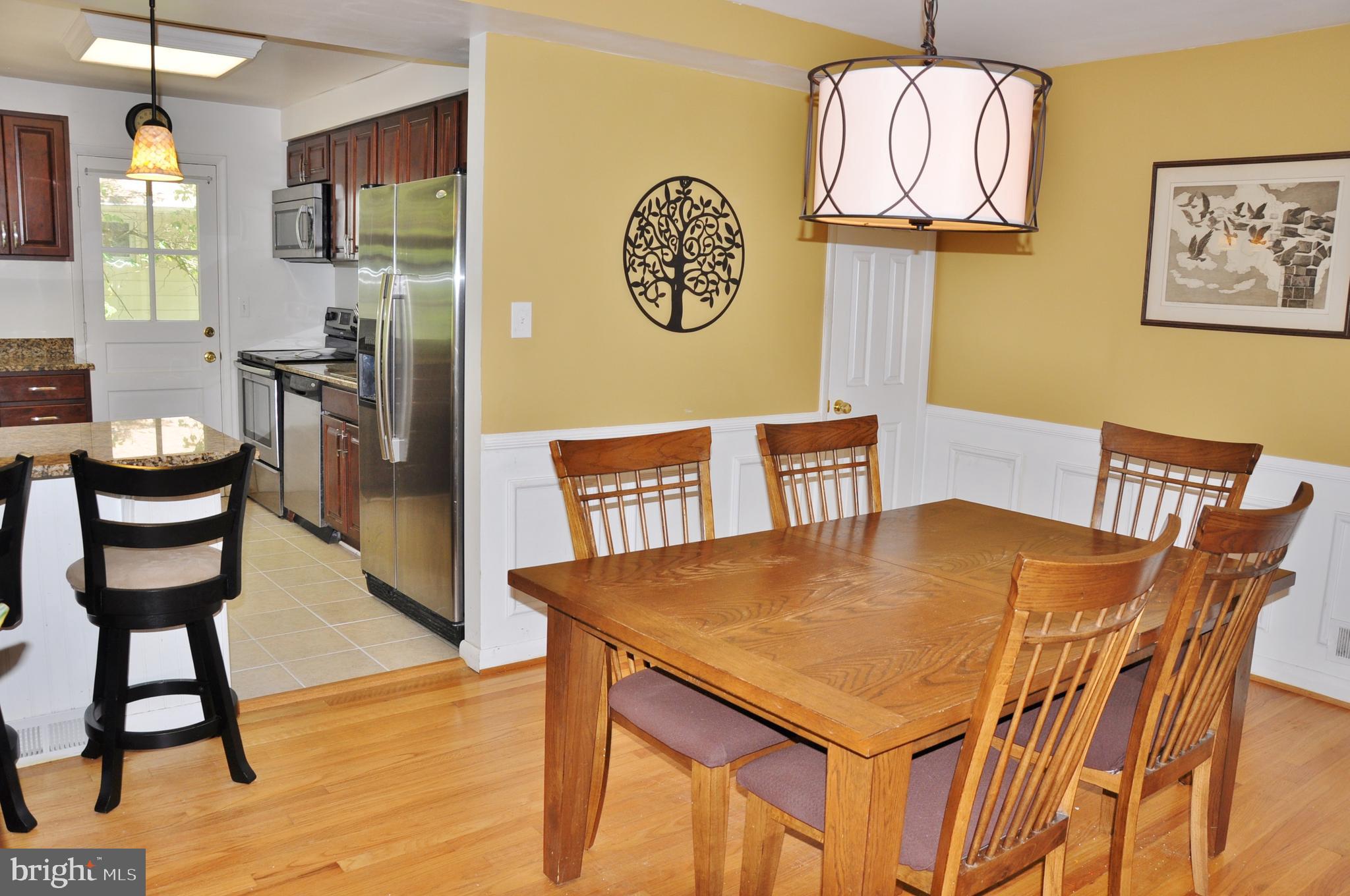6756 Glenkirk Road Baltimore, MD 21239 - Photo 3 of 83 Wonderful dining room with wainscoting.