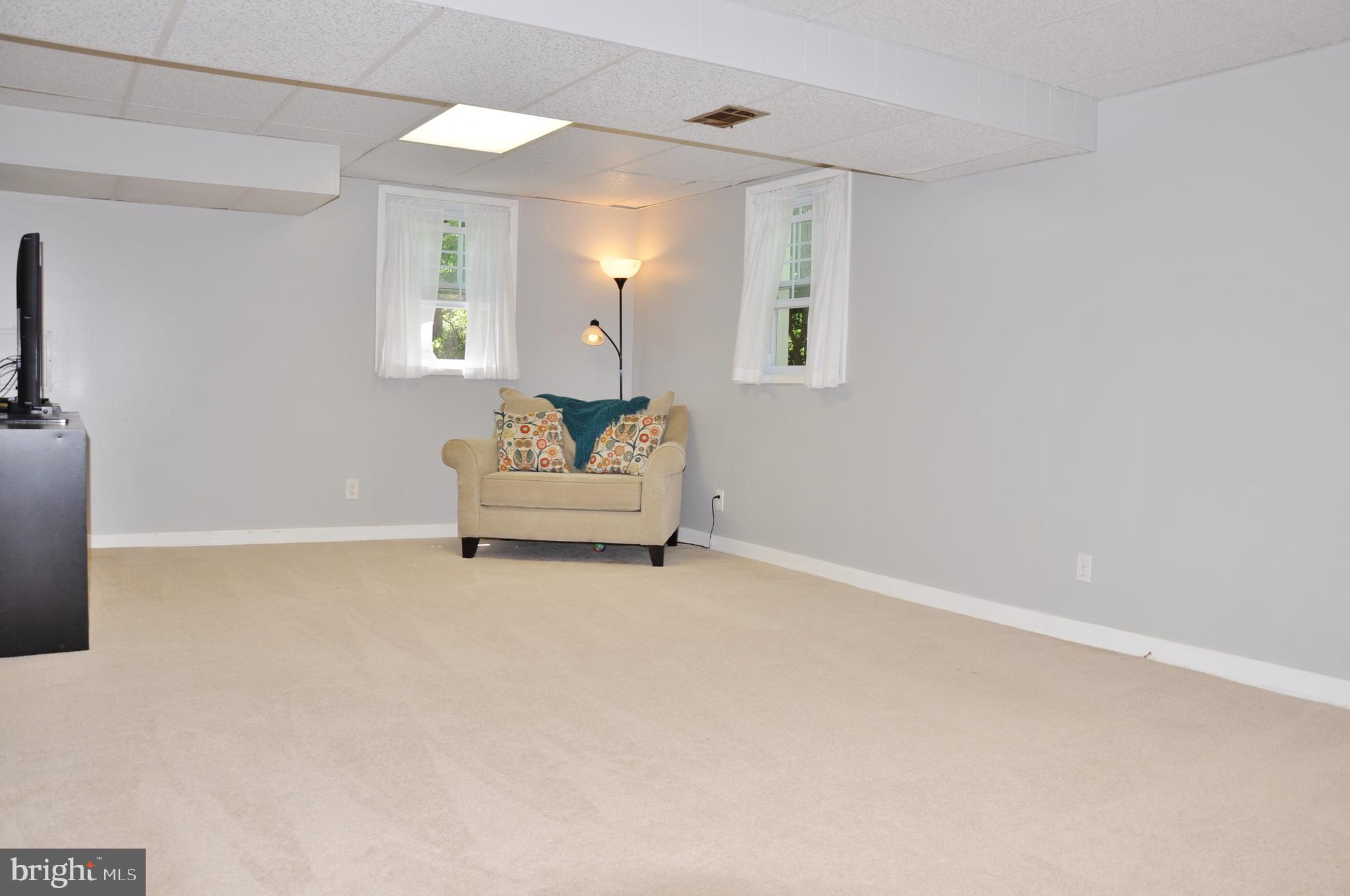 6756 Glenkirk Road Baltimore, MD 21239 - Photo 5 of 83 Finished lower level complete with half bath.