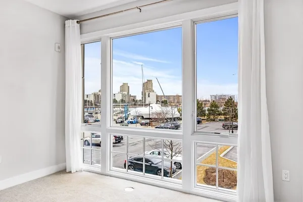 a view of a living room and a window